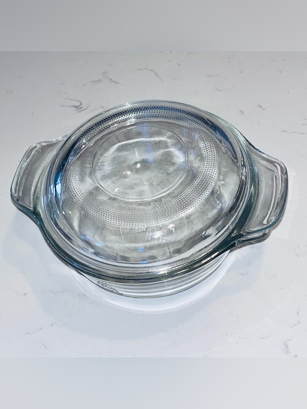 vintage Anchor Hocking 12 oz clear glass casserole dish with a tab-handled lid